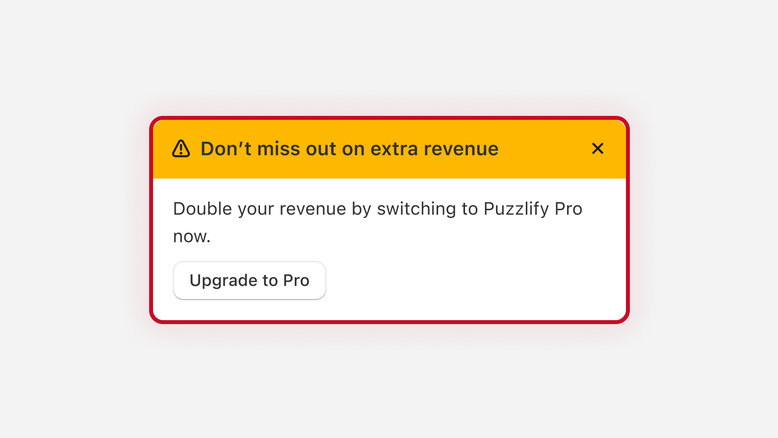A dismissible warning banner in yellow that reads "Double your revenue by switching to Puzzlify Pro now". The banner includes a button that's labeled "Upgrade to Pro".